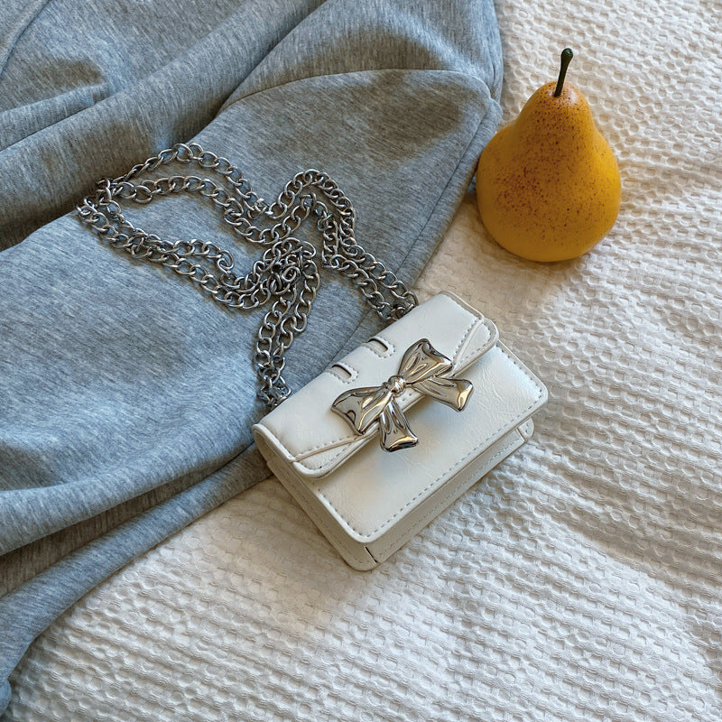 Ladies Mini Handbag with Shimmering Bow Closure