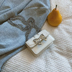 Ladies Mini Handbag with Shimmering Bow Closure