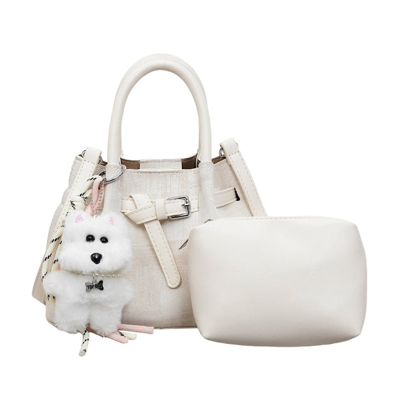 Women’s mini handbag with modern accents and practical interior organizer