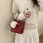 Women's mini handbag with cute charm