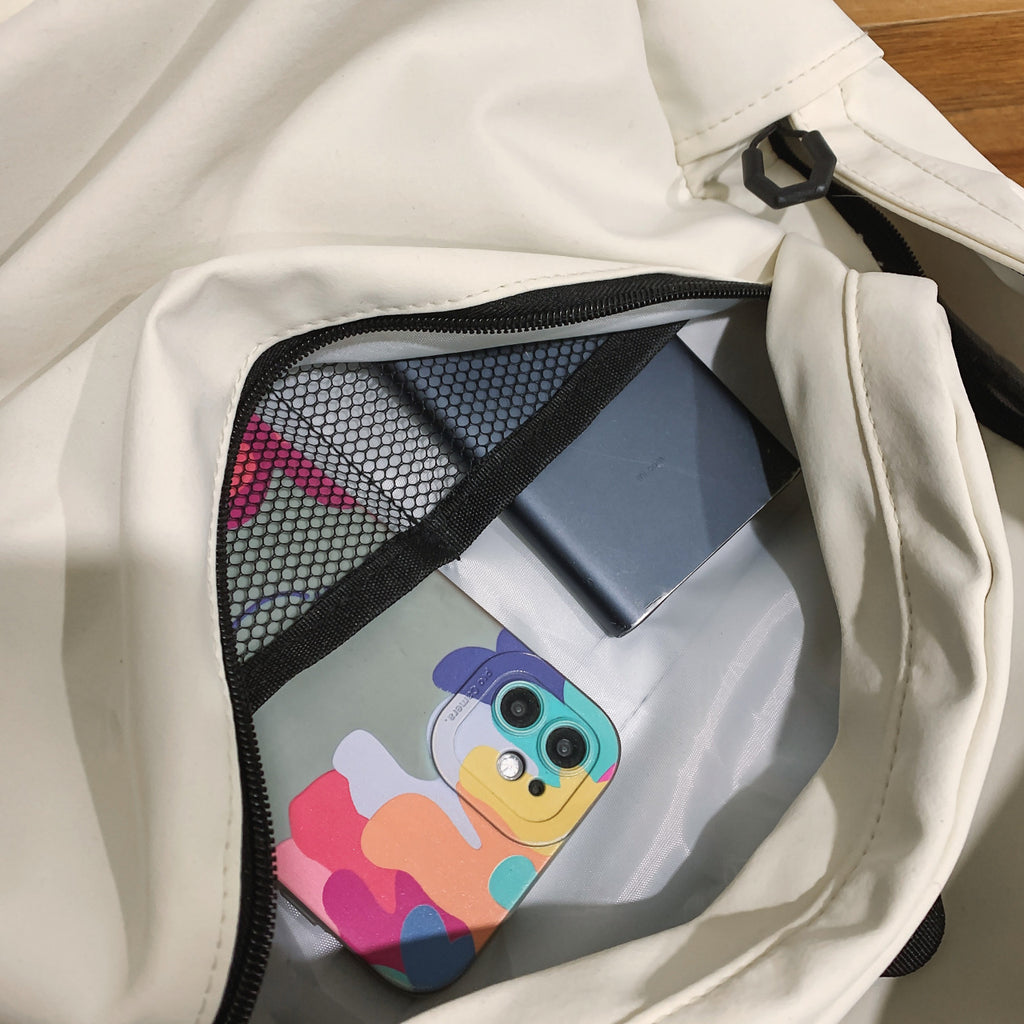 Backpack with practical inner and outer pockets