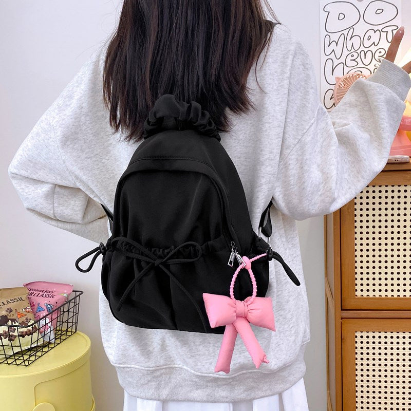 Fashionable backpack with playful details