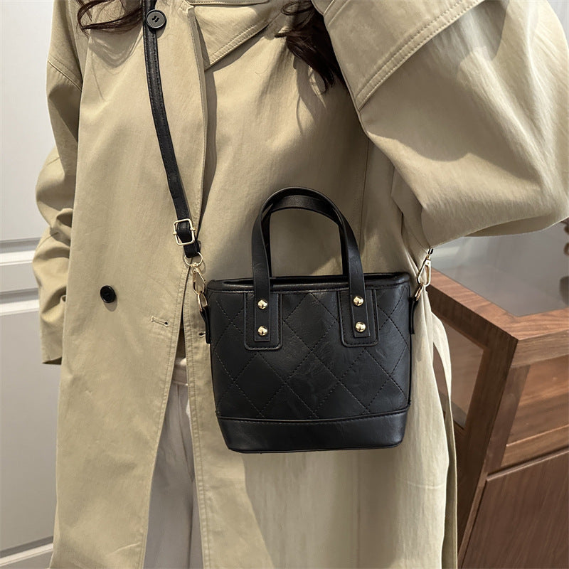 Women's elegant mini bucket bag with detachable shoulder strap