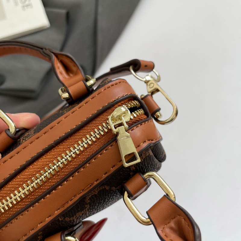 Ladies mini handbag with luxurious accents and adjustable shoulder strap