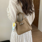 Ladies mini handbag with detachable cosmetic pouch