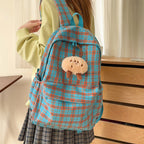 Backpack with Practical Check Pattern and Cute Plush Pendant