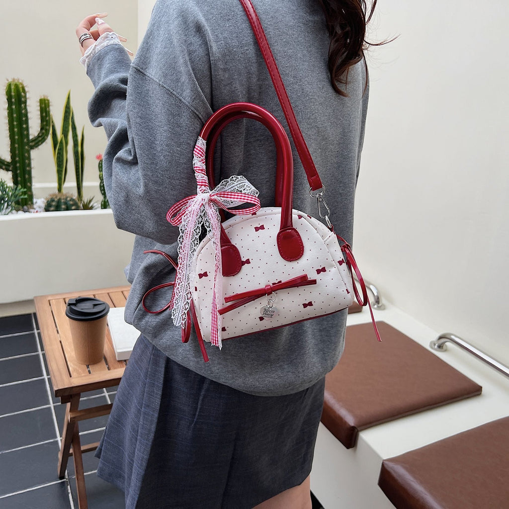Women’s mini bag with playful design and charming details