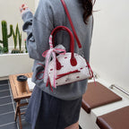 Women’s mini bag with playful design and charming details
