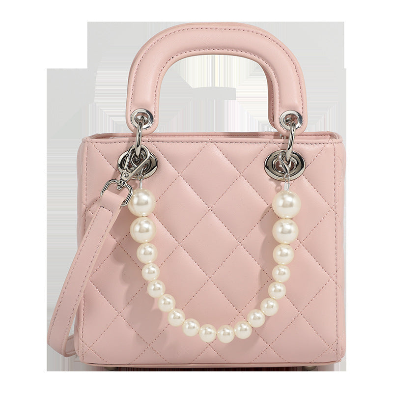 Ladies mini handbag with pearl-embellished chain and quilted design