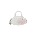 Ladies trendy mini handbag with striking pearl applications