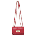 Women’s mini handbag with quilted design and golden clasp