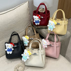 Ladies mini handbag with detachable cosmetic pouch