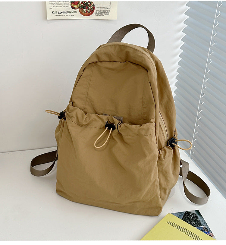 Leisure backpack with innovative drawstring and comfortable carrying system
