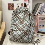 Backpack with Fashionable Check Pattern and Practical Compartments