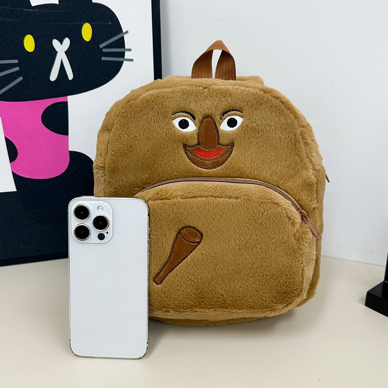 Plush children's backpack with cute monkey design