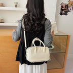 Women’s mini handbag with textured artificial leather and elegant design