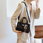 Ladies elegant mini bag with detachable pendant