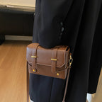 Women's mini handbag with textured design and detachable shoulder strap