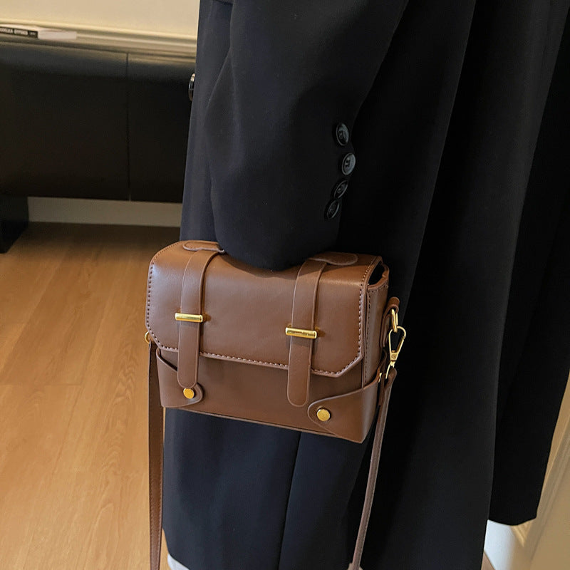 Women's mini handbag with textured design and detachable shoulder strap