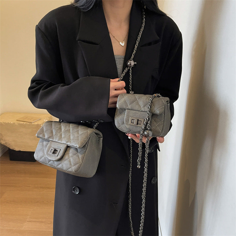 Women's mini handbag with padded design and elegant chain strap