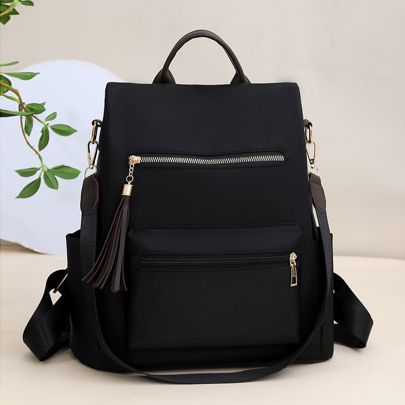 Elegant Multi-Pocket Backpack with Detachable Strap
