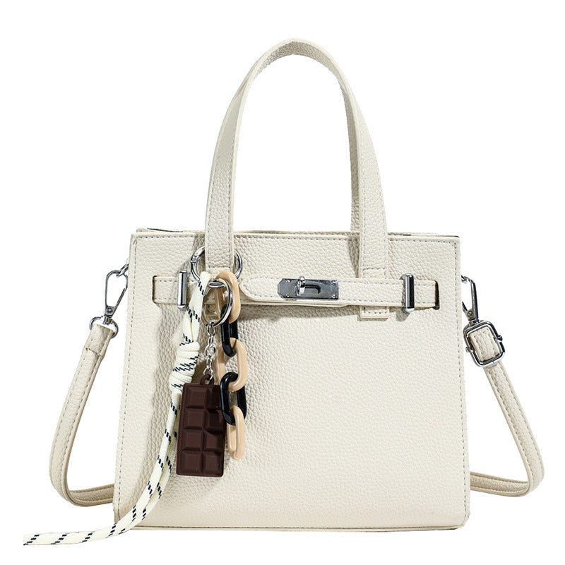 Ladies elegant mini bag with detachable pendant