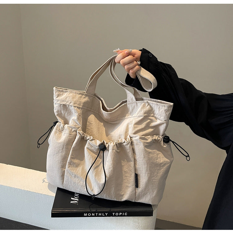 Practical everyday handbag with drawstring