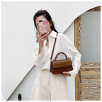 Ladies elegant shoulder bag with detachable carrying strap
