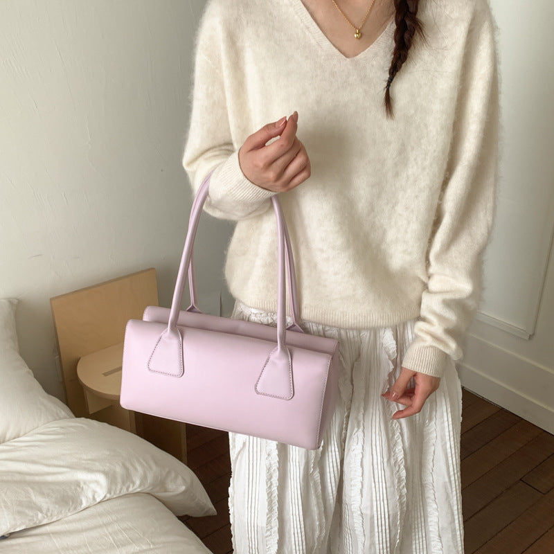 Ladies elegant handbag with minimalist silhouette