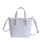 Women's mini bag with elegant structure and practical carrying handle