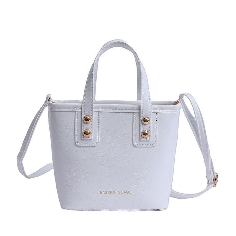 Women's mini bag with elegant structure and practical carrying handle