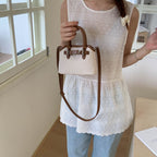 Women's mini bag with adjustable shoulder strap
