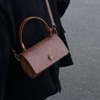 Women's elegant handbag with detachable shoulder strap