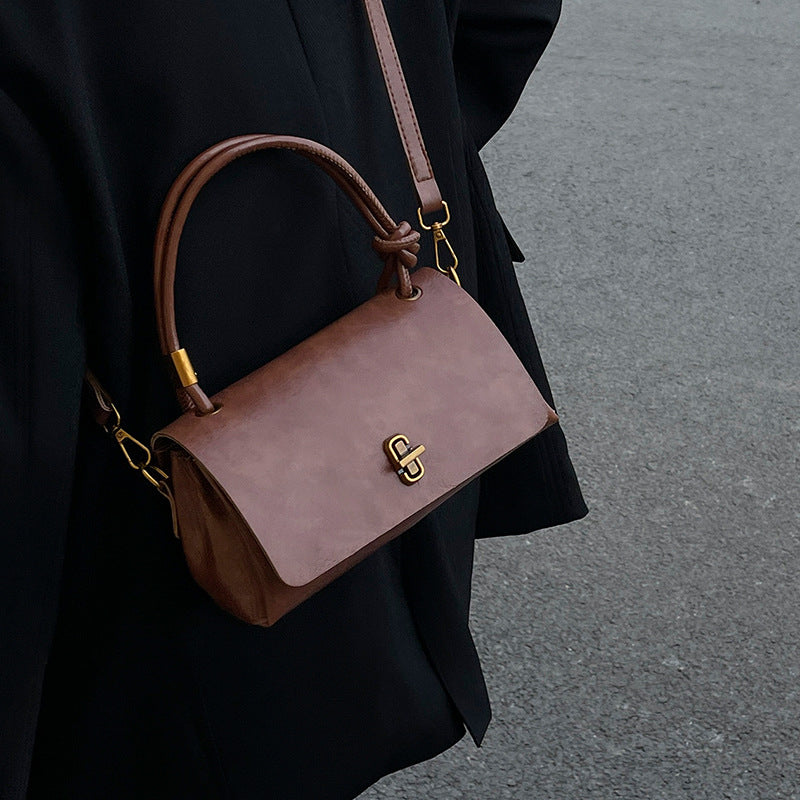 Women's elegant handbag with detachable shoulder strap