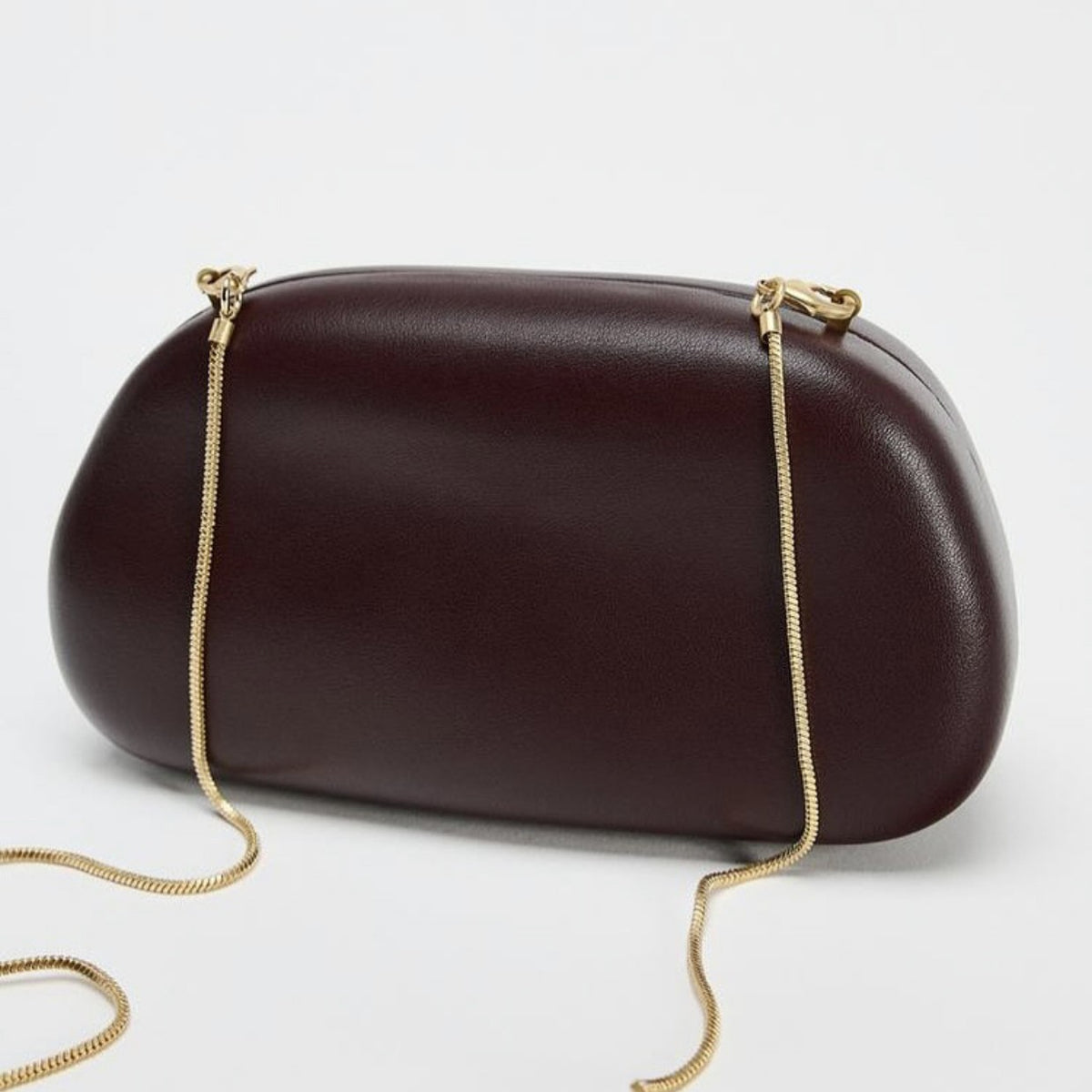 Statement Clutch with Sculptural Handle