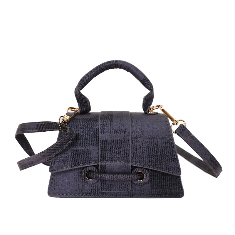 Women's elegant mini handbag with textured design