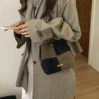Women’s mini hobo bag made of high-quality suede leather with decorative stitching