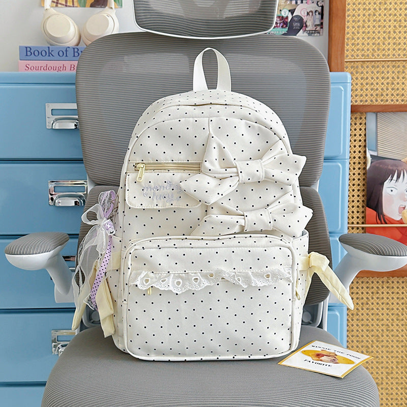 Backpack with Playful Bows and Practical Storage Solutions