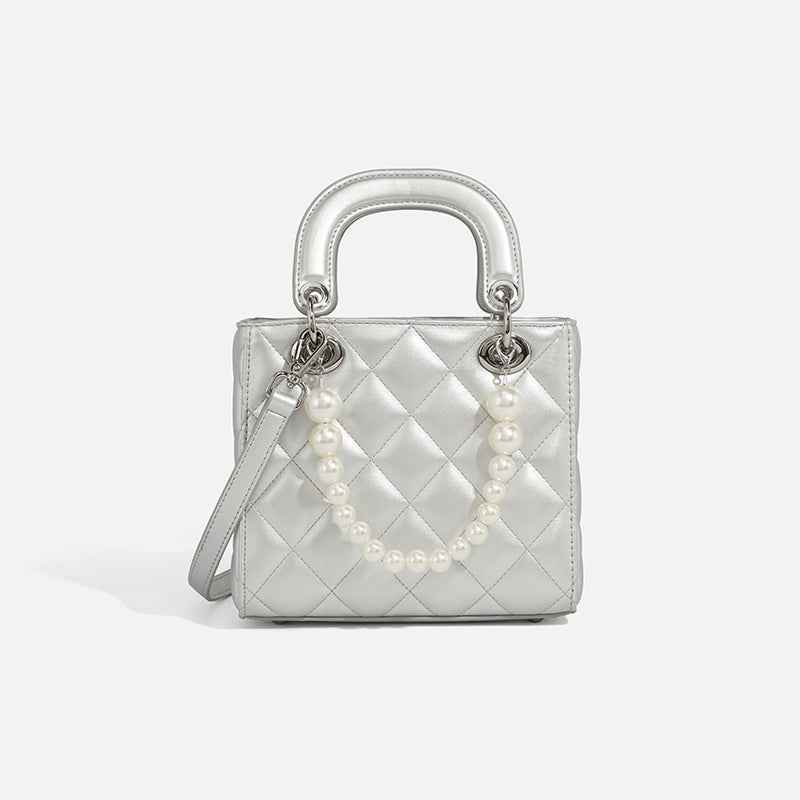 Ladies mini handbag with pearl-embellished chain and quilted design