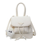 Women's mini backpack with playful design and plush pendant