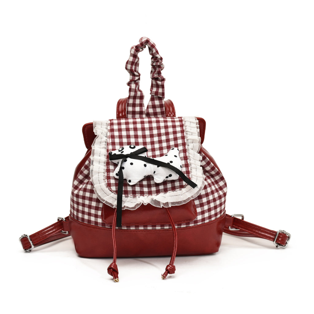 Playful backpack with checkered pattern and animal appliqué