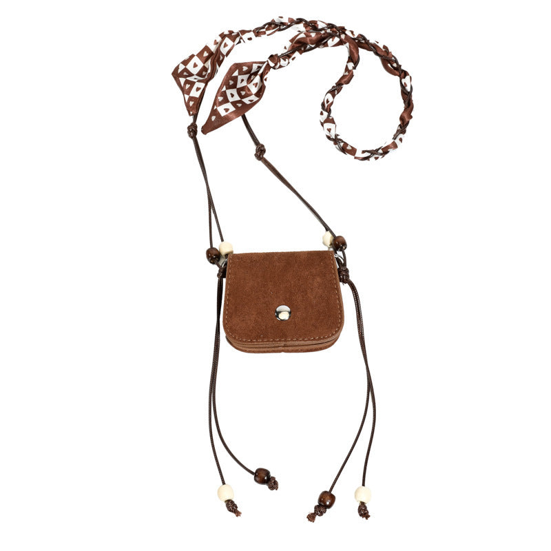 Women's mini handbag with adjustable chain strap and customizable design