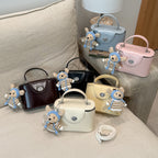 Women’s mini handbag with cute animal pendant