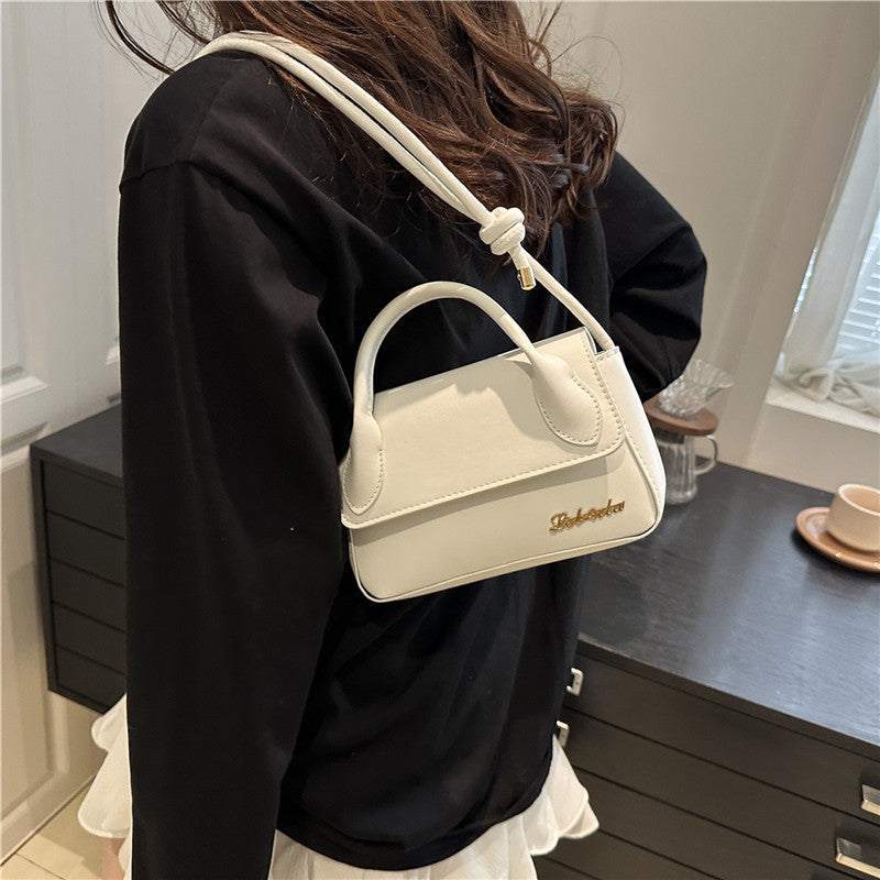 Women's mini handbag with detachable shoulder strap