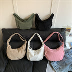 Shoulder bag with artistic fan design