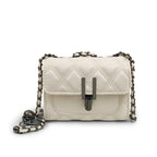 Women’s mini clutch with elegant chain strap and luxurious quilted pattern