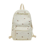 Playful Dog Patterned Backpack