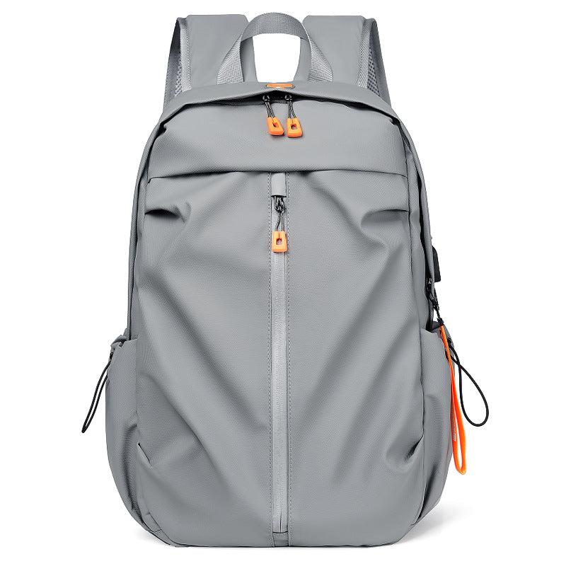 Ergonomic everyday backpack with innovative compartments and waterproof material