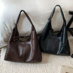 Women's hobo bag with floral design and practical mini organizer