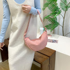 Shoulder bag with adjustable shoulder strap and practical compartments